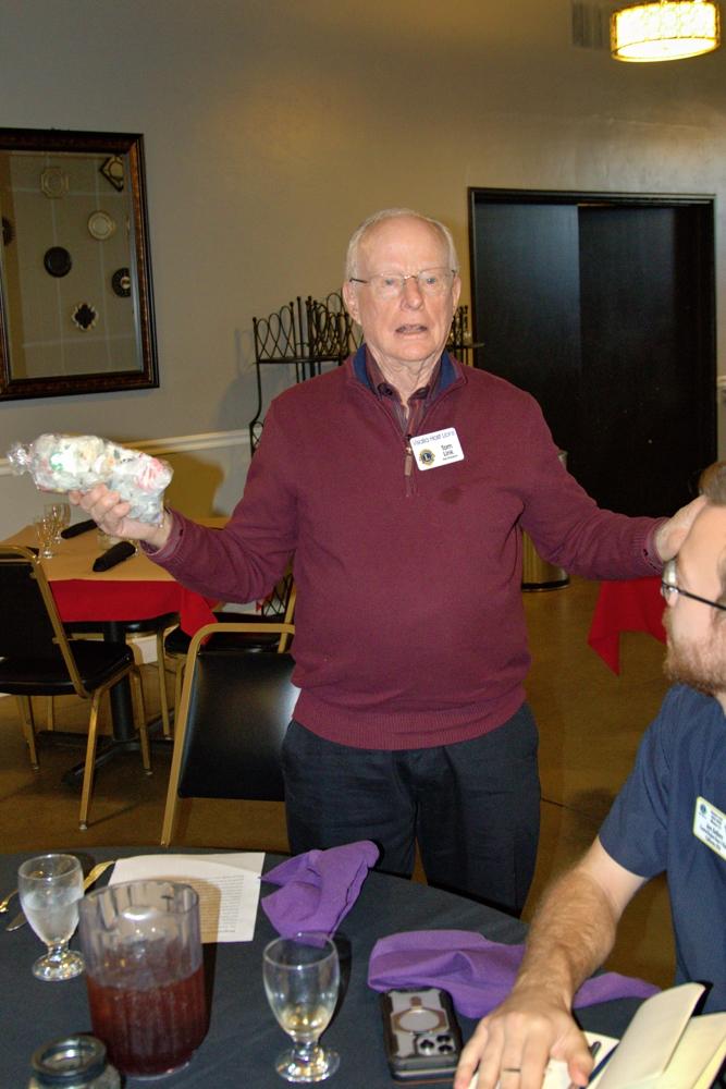 Lion tom auctions off a bag of salt water taffee