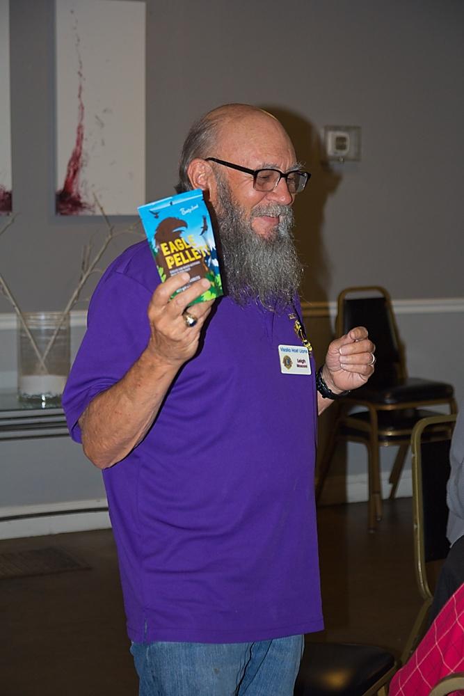 Lion Leigh auctions off Eagle Pellets. 