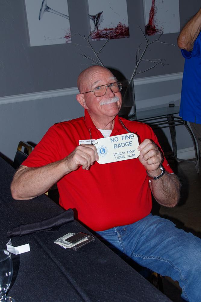 Lion Brad with his no fine badge. 