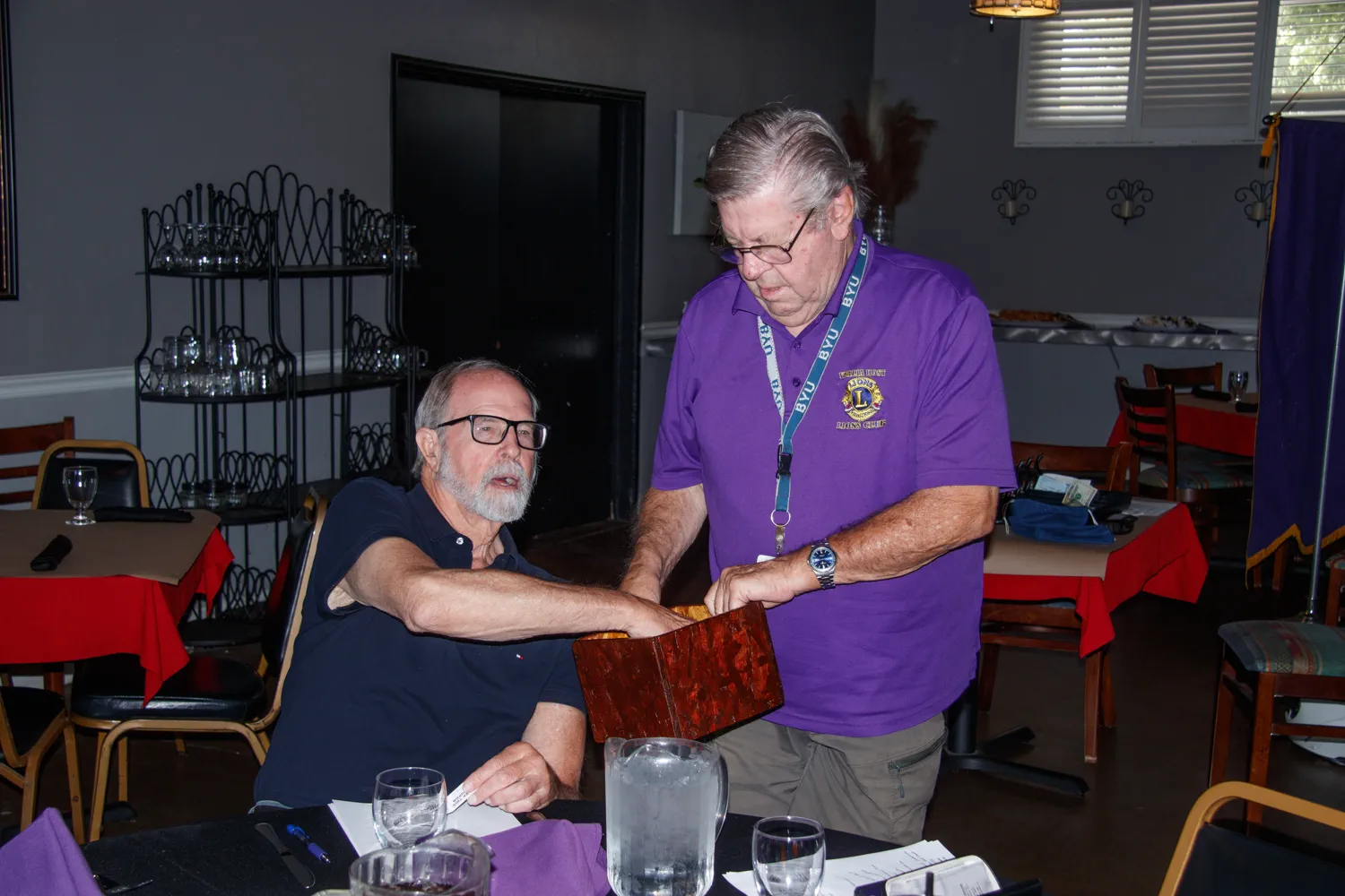 Lion Tom Gaebe draws a ticket